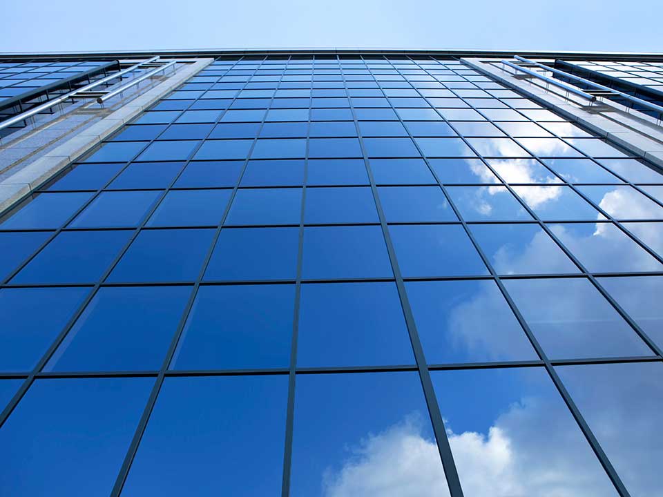 Floor to ceiling windows on a large commercial building