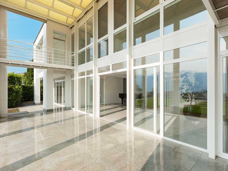 Large windows on a white modern home